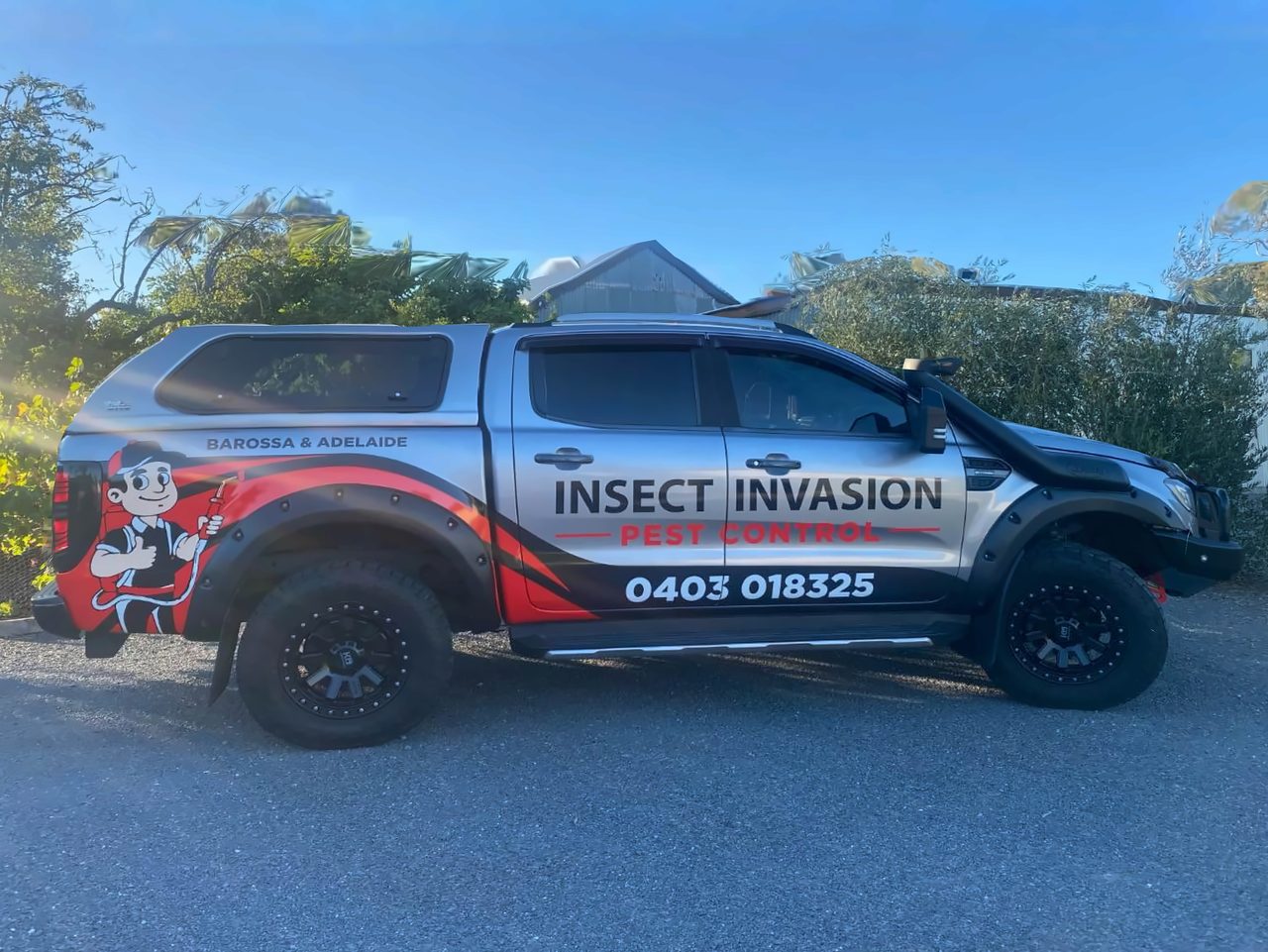 The Insect Invasion pest control ute, signwritten Barossa & Adelaide with Garry's number 0403 018 325, the ute Garry and Josh drive to every fly & mosquito control job